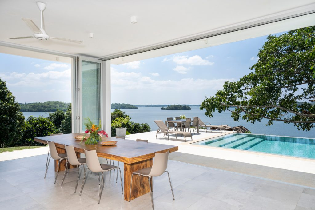 Luxury villa dining room overlooking Koggala Lake